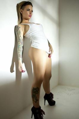 Christy Mack wearing nothing but a beater