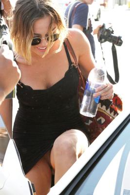 Miley Cyrus sexy tight black dress