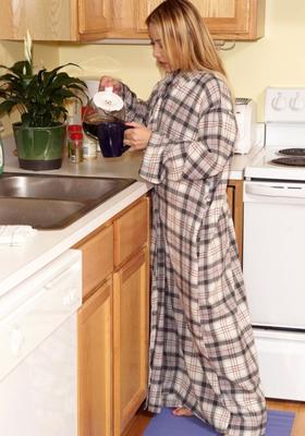 Kat plays in the kitchen