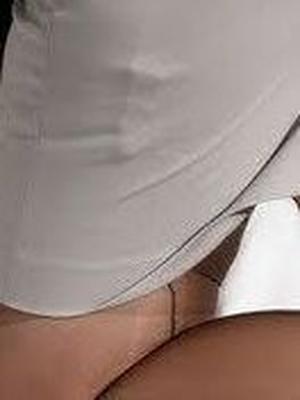 Garter belt almost invisible under the ..