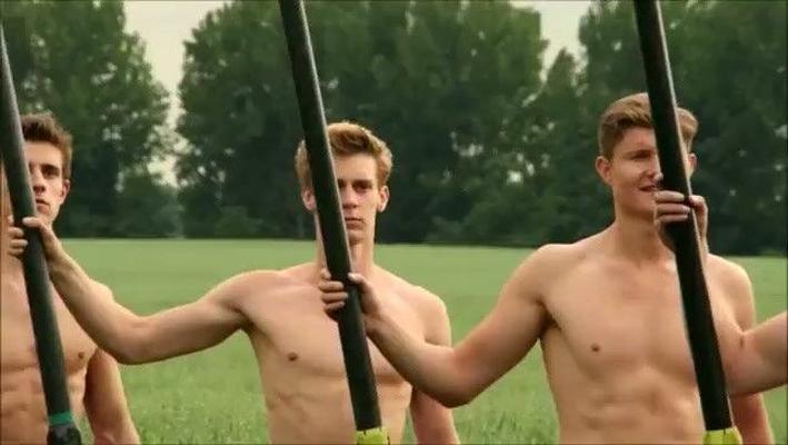 Naked sportsman boys having fun outdoors